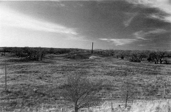 Black and white photo of sand dunes near North Fork Solomon River meander.