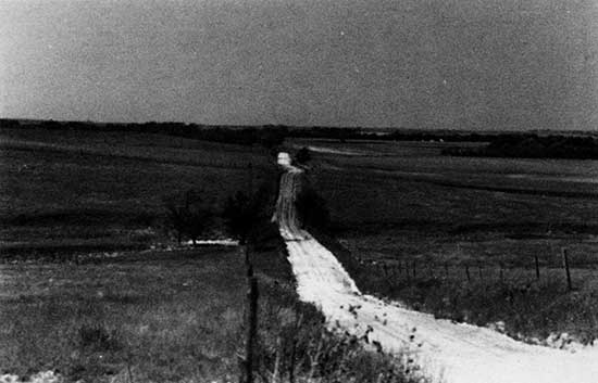 Black and white photo of Pierre Shale exposed in roadcut.