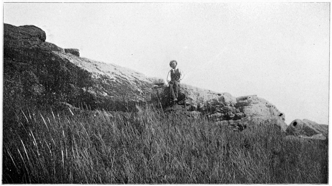 Black and white photo: Dakota Sandstone at top of Soldier Cap Mound, Saline County.