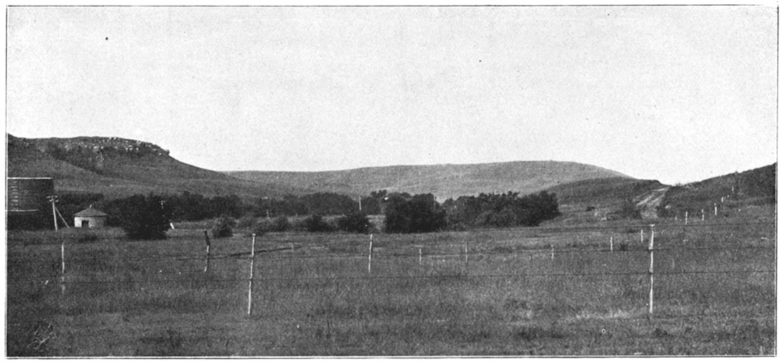 Black and white photo: Dakota Sandstone bluffs along Union Pacific Railroad, six miles west of Brookville.