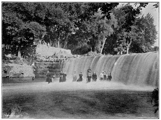 Black and white photo of Bathing in Rock Creek, Louisville Springs.