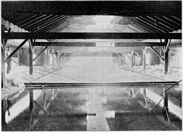 Black and white photo of interior of a Hutchinson Salt Plant, showing evaporating pans.