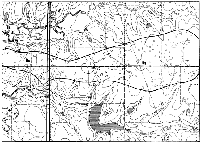 Black and white geologic map showing sinkhols withing unit 9s outline.