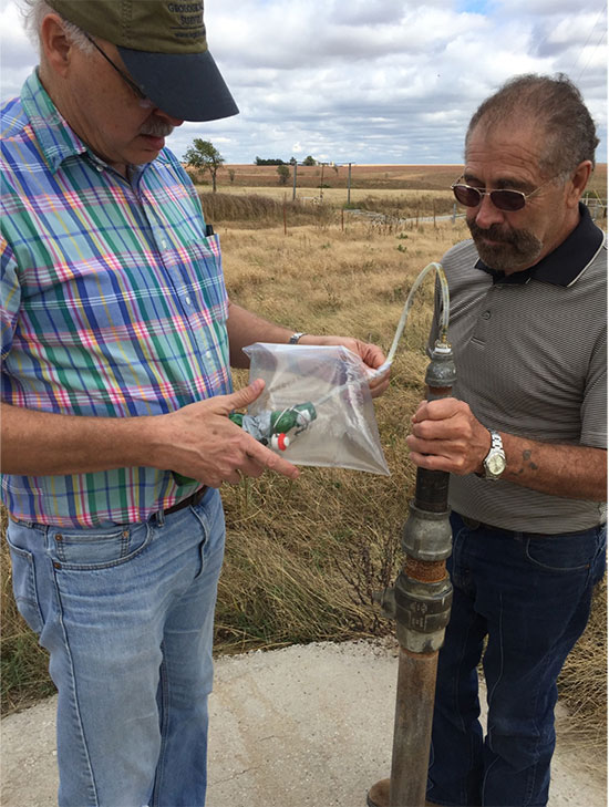 Color photo of collecting the gas emitted.