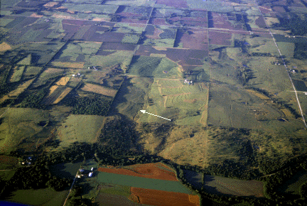 These cuestas are near Pomona. The arrow points to a steep slope called an escarpment.