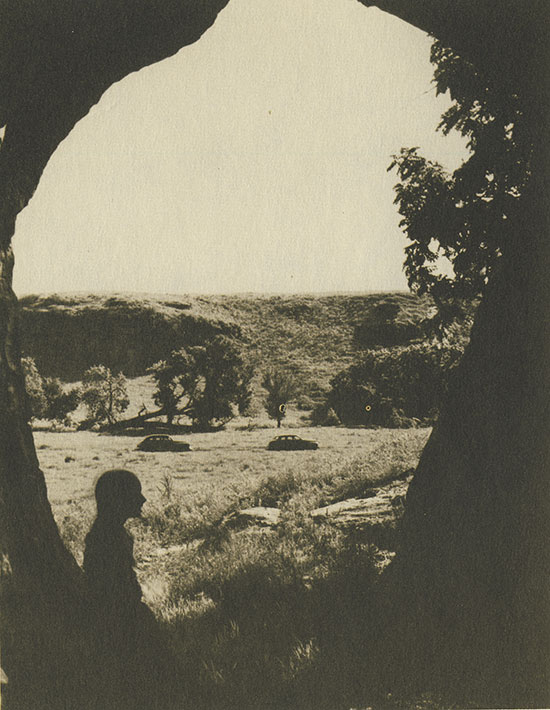 Sepia photo of view out of Palmer's Cave in Ellsworth County.